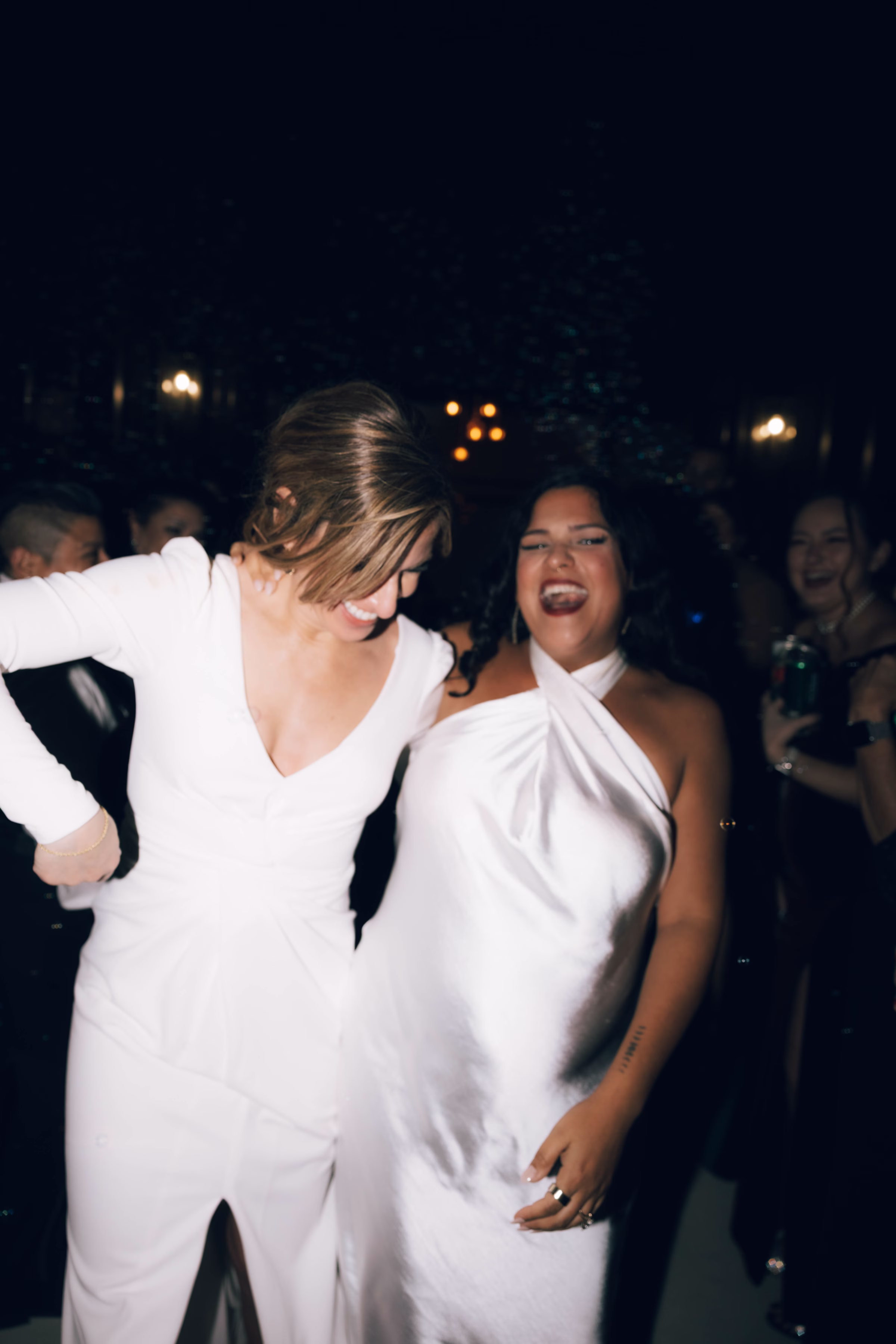 Wedding guests dancing and celebrating at The Foxwood Hill Country Texas wedding venue during evening reception
